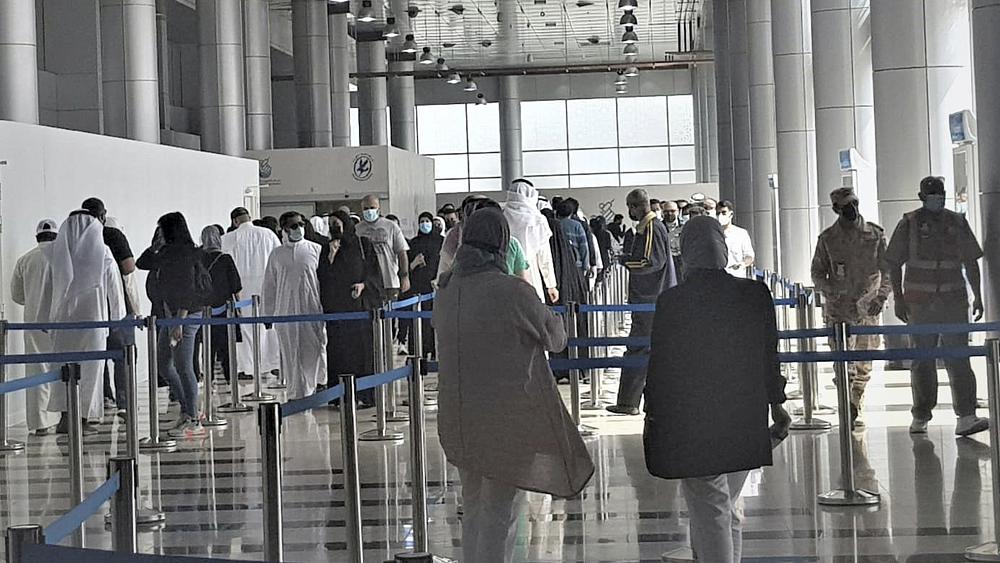 'It's life and death': Kuwait joins race to vaccinate, but only for locals