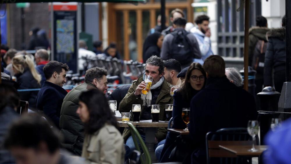 COVID lockdown easing: Shoppers and pubgoers flock to streets as venues reopen in England