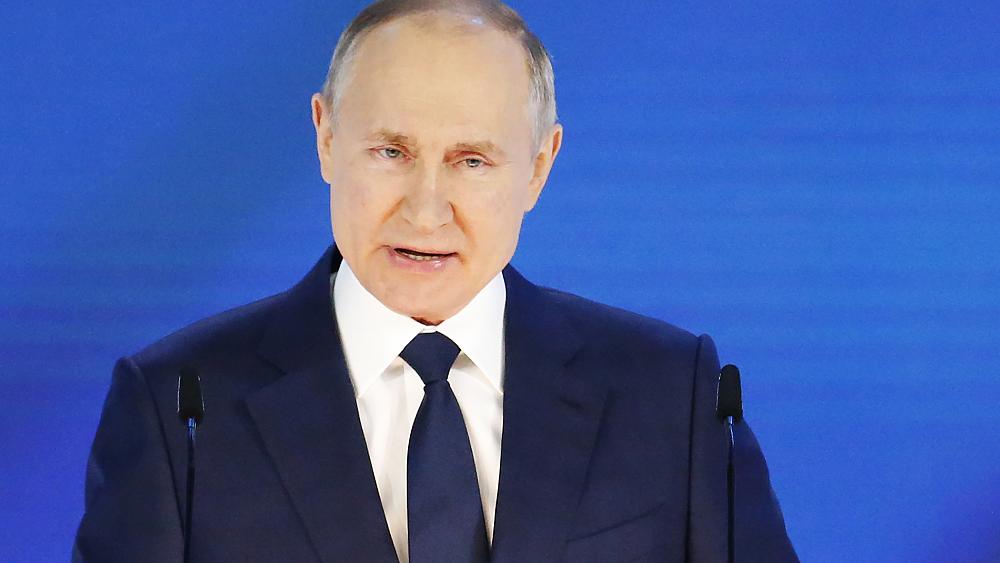 Russian President Vladimir Putin warns foreign rivals not to 'cross a red line'