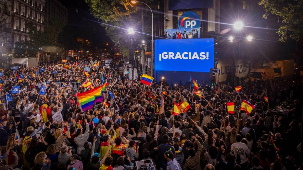 Conservative opposition Popular Party wins in Madrid regional elections as Podemos leader quits