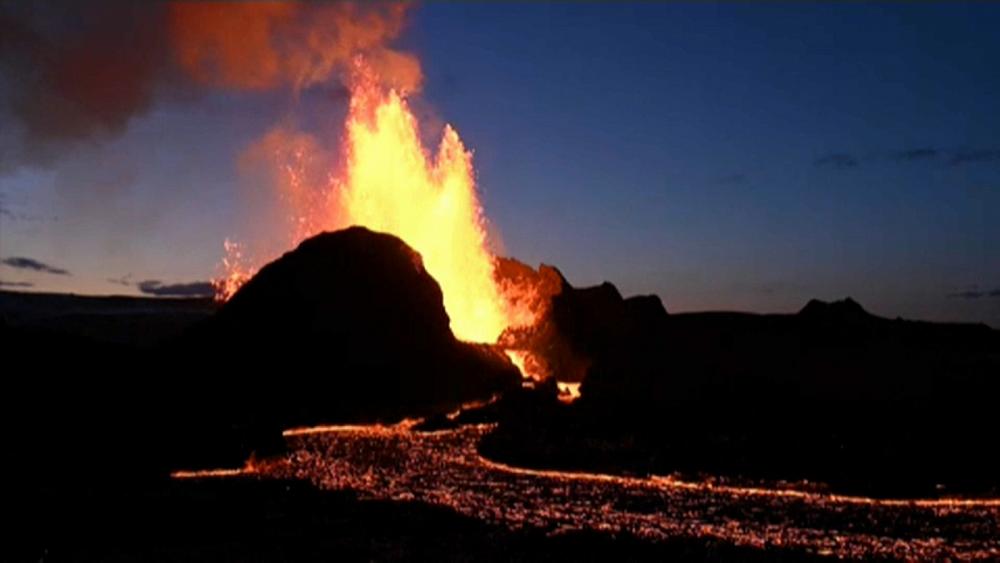 An erupting volcano in Iceland is drawing tourists from around the world
