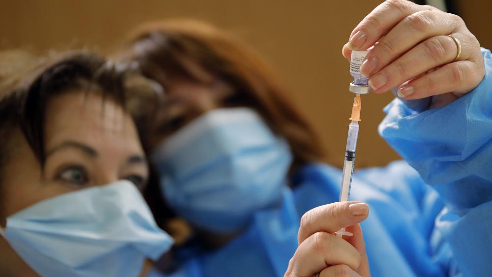 France opens coronavirus vaccination to all adults on May 31, two weeks sooner than planned
