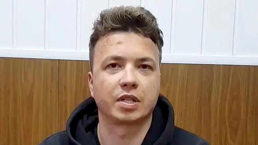 Belarus: Arrested journalist appears in prison video aired on state TV