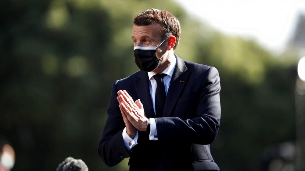 France lifts requirement to wear a face mask outdoors in public and stops nighttime curfew early