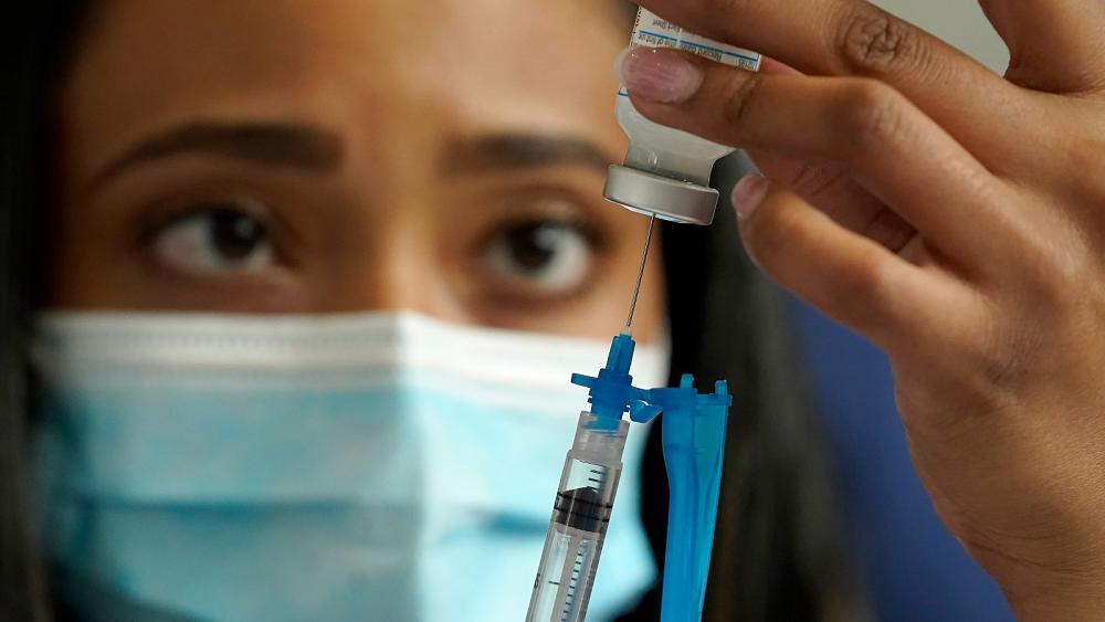 COVID-19 vaccine benefits outweigh risks, despite rare heart inflammation, CDC